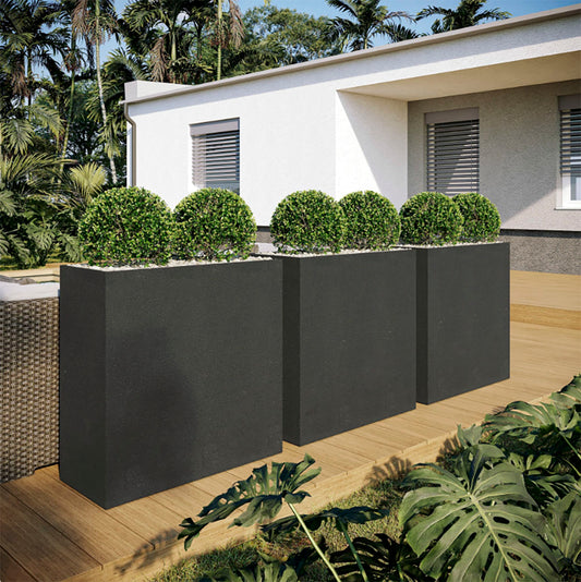 Lifestyle view of the Encinitas Large Rectangular GFRC planter with clean architectural lines, designed for indoor or outdoor use in residential or commercial settings.