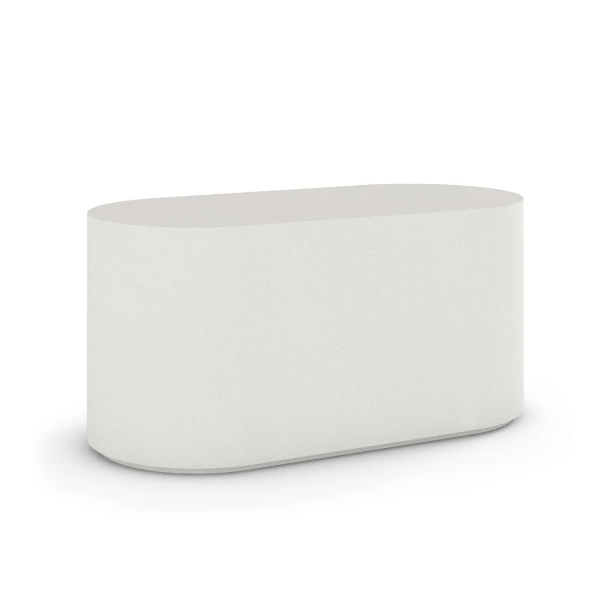 Angled view of the Capitola Oval Concrete Table, cast in lightweight GFRC with smooth curves and refined detailing, shown here in the Glacial Mist finish.