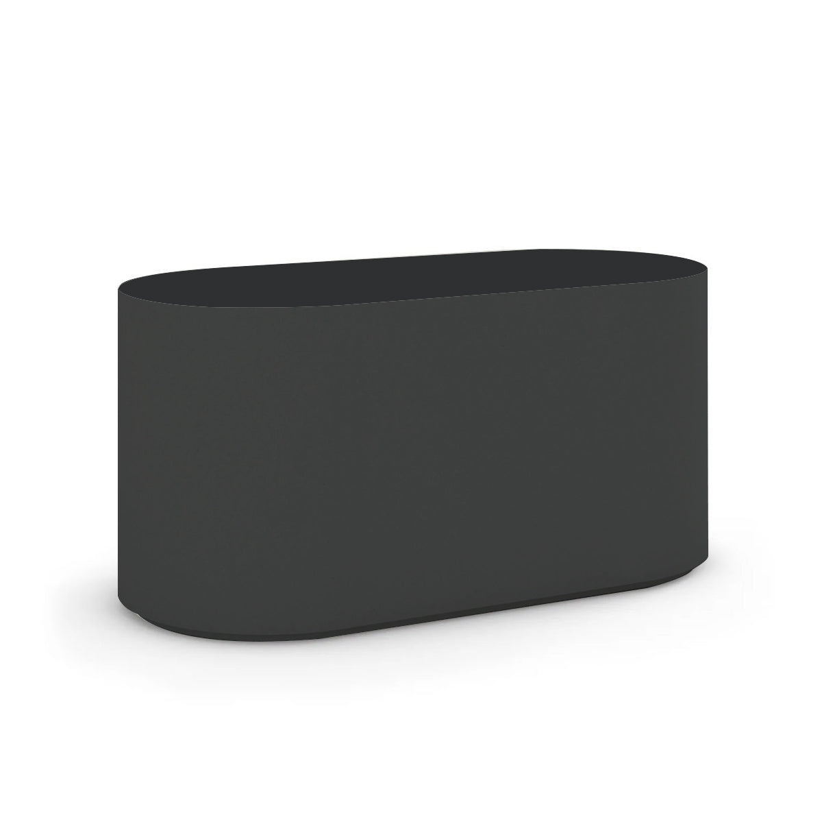 Angled view of the Capitola Oval Concrete Table, cast in lightweight GFRC with smooth curves and refined detailing, shown here in the Obsidian Night finish.