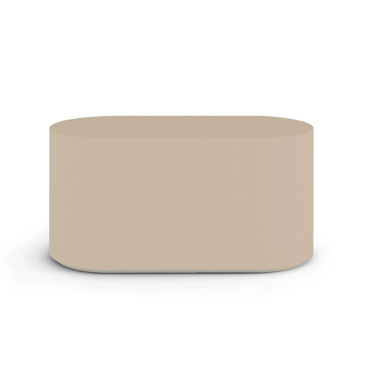 Side profile of the Capitola Oval Concrete Table, highlighting the seamless GFRC construction and soft oval shape, shown in the Desert Dawn finish.