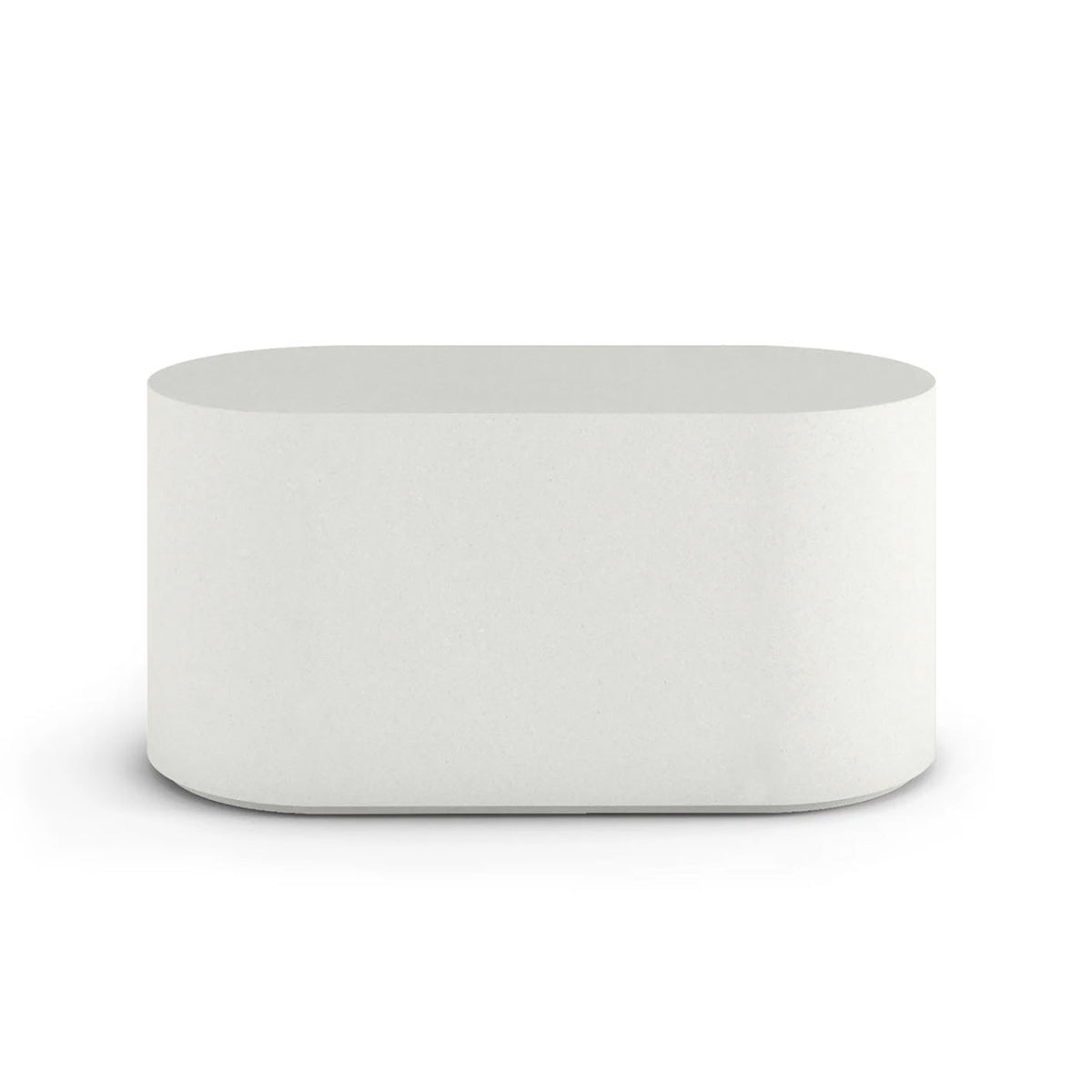 Side profile of the Capitola Oval Concrete Table, highlighting the seamless GFRC construction and soft oval shape, shown in the Glacial Mist finish.
