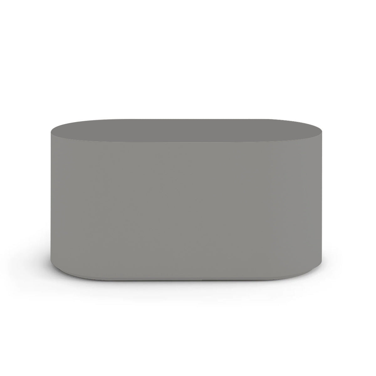 Side profile of the Capitola Oval Concrete Table, highlighting the seamless GFRC construction and soft oval shape, shown in the Silver Mist finish.