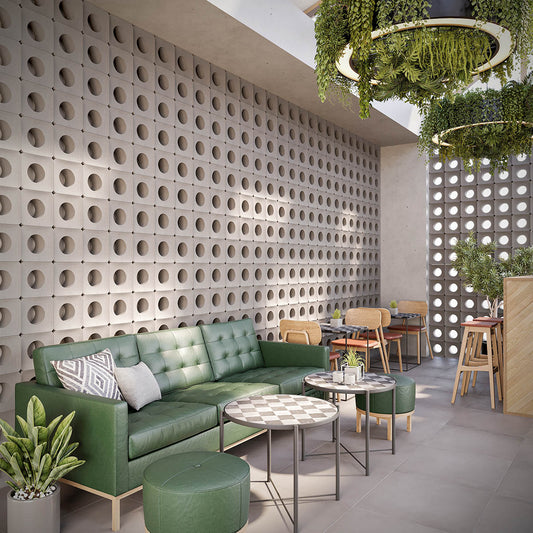 Wall installation of Cayucos breeze blocks in a contemporary cafe setting, providing a geometric pattern, filtered light, and natural ventilation.