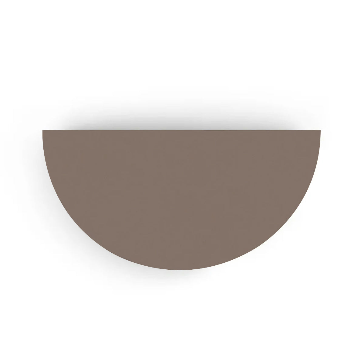 An overhead view of the Half Moon Concrete Table highlights the seamless GFRC construction and soft semicircular shape shown in the Riverbed Earthfinish.