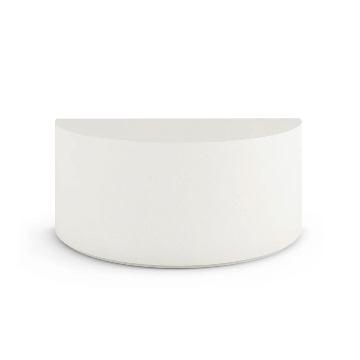 Side profile of the Half Moon Concrete Table, highlighting the seamless GFRC construction and soft Semicircular shape, shown in the Glacial Mist finish.