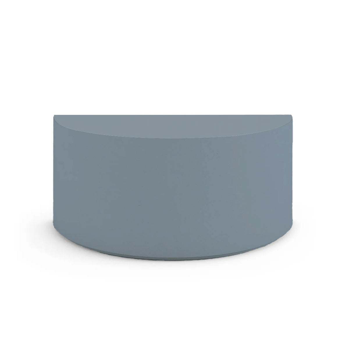 Side profile of the Half Moon Concrete Table, highlighting the seamless GFRC construction and soft Semicircular shape, shown in the Seafoam Slate finish.
