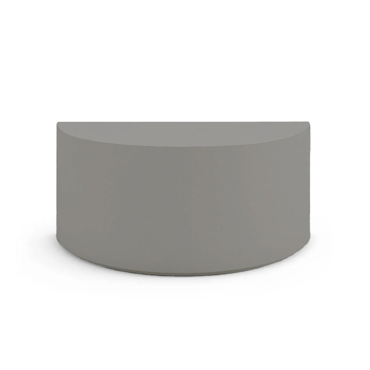 Side profile of the Half Moon Concrete Table, highlighting the seamless GFRC construction and soft Semicircular shape, shown in the Silver Mist finish.