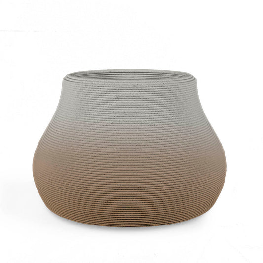 Pacifica Small Concrete Planter - Toasted Almond OMB2 - sculptural rounded planter with soft curving silhouette and fine horizontal ribbed texture, 3D printed concrete, modern organic design