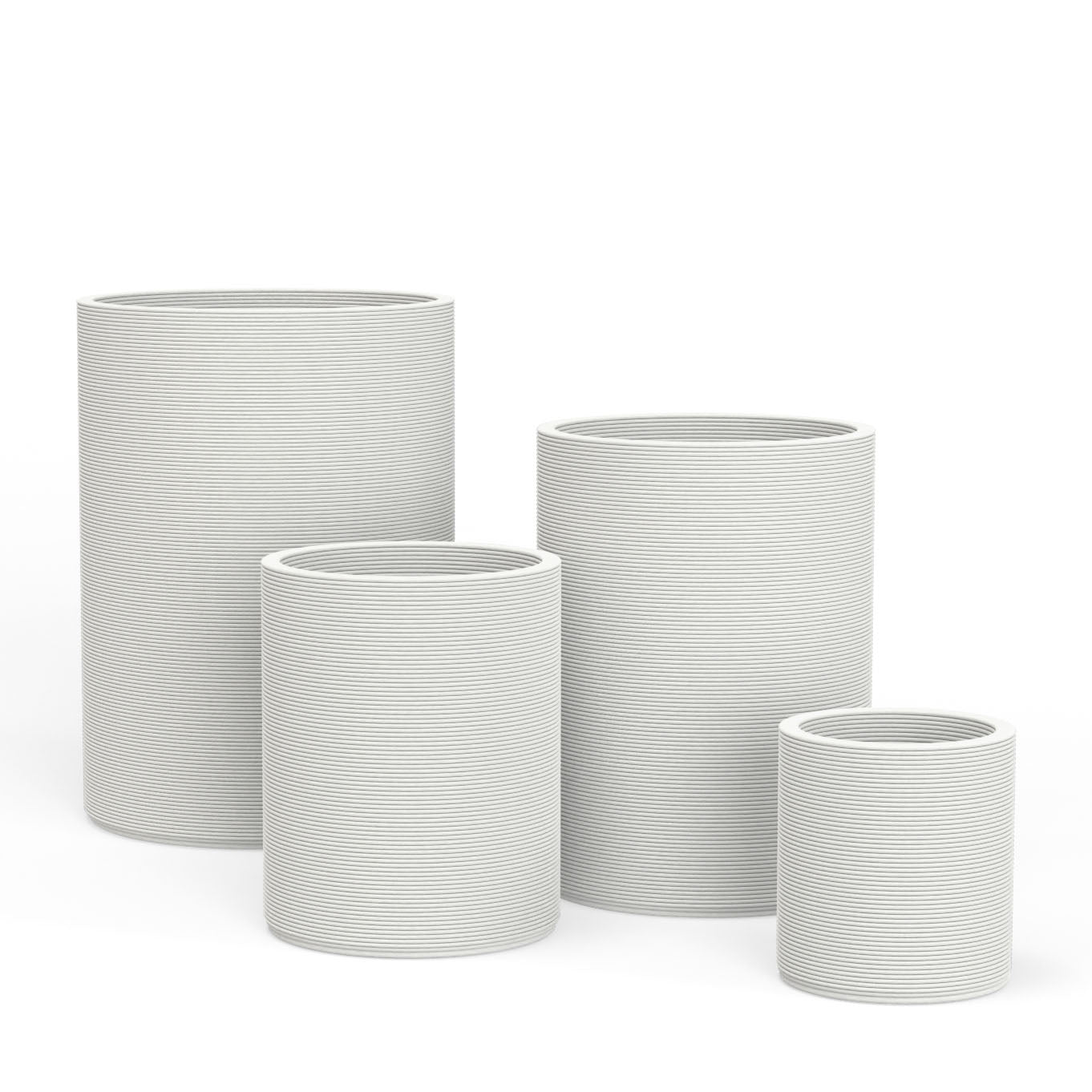 Set of Avila rectangular concrete planters in varying sizes featuring a stacked-patterned GFRC for indoor or outdoor use in the Glacial Mist finish.