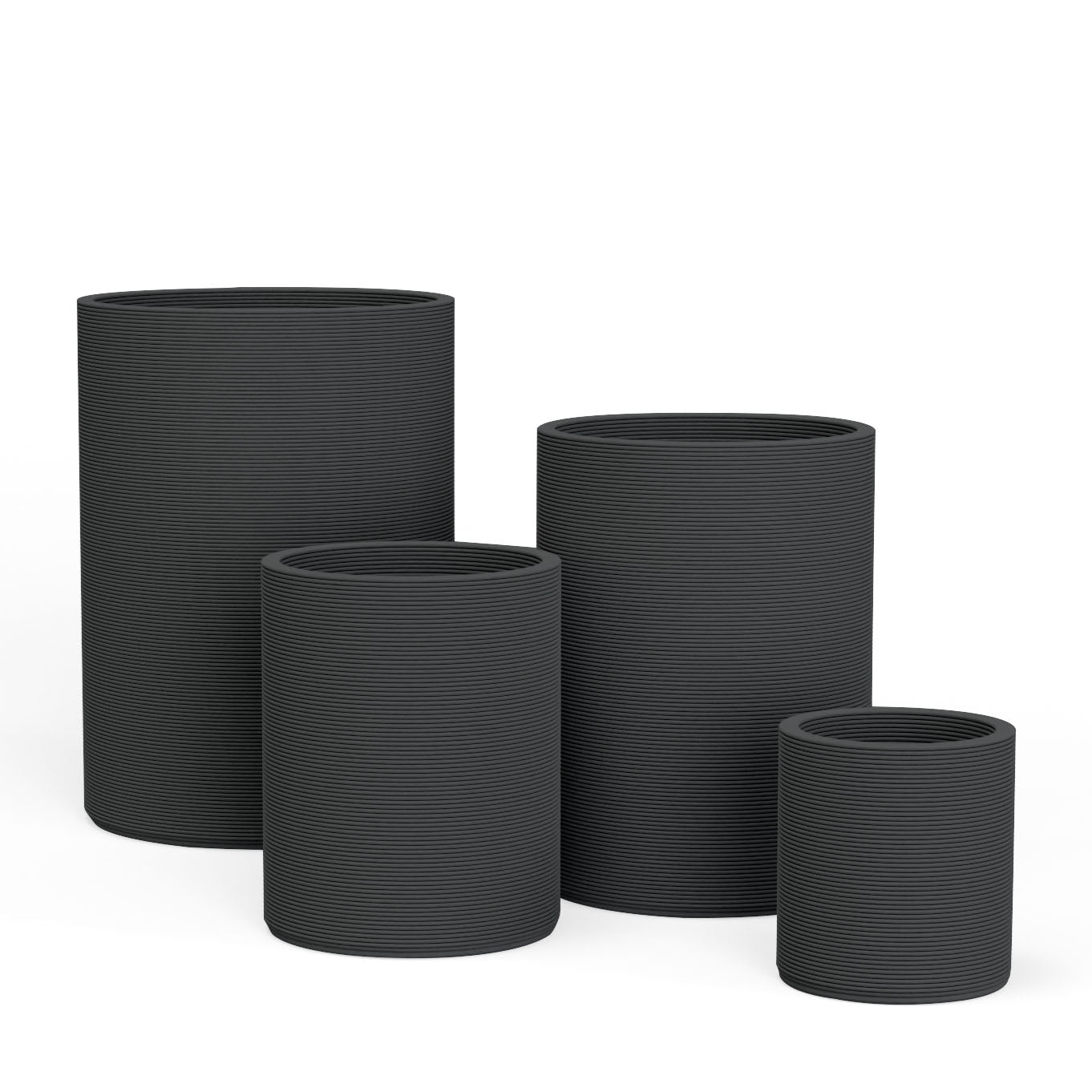 Set of Avila rectangular concrete planters in varying sizes featuring a stacked-patterned GFRC for indoor or outdoor use in the Obsidian Night finish.