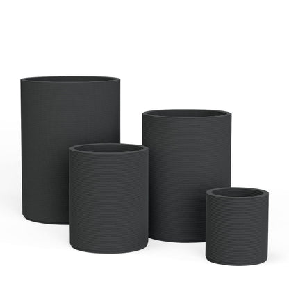 Set of Avila rectangular concrete planters in varying sizes featuring a stacked-patterned GFRC for indoor or outdoor use in the Obsidian Night finish.