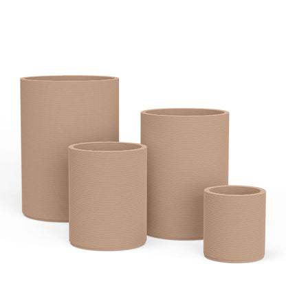 Set of Avila rectangular concrete planters in varying sizes featuring a stacked-patterned GFRC for indoor or outdoor use in the Sandy Bluff finish.