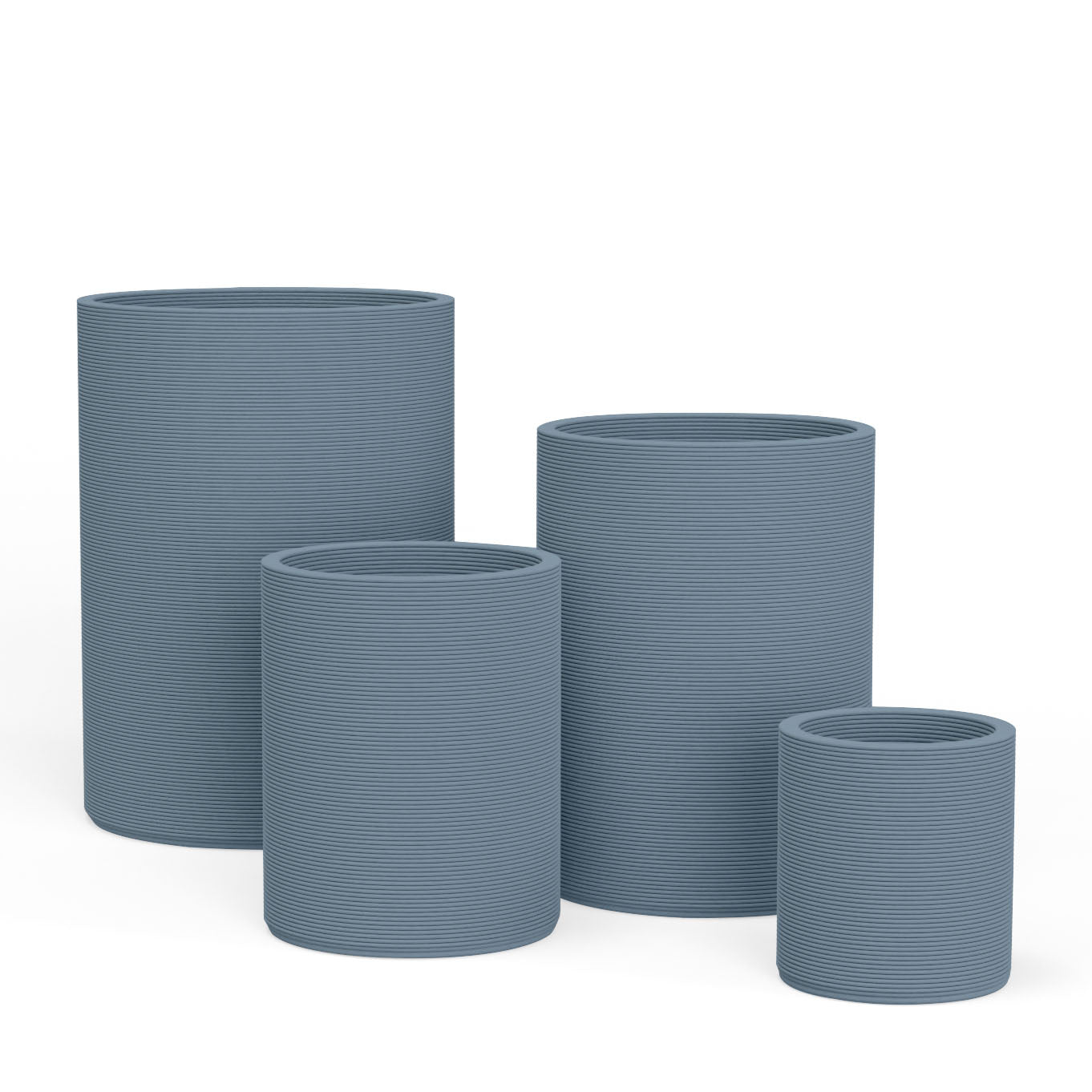 Set of Avila rectangular concrete planters in varying sizes featuring a stacked-patterned GFRC for indoor or outdoor use in the Seafoam Slate finish.