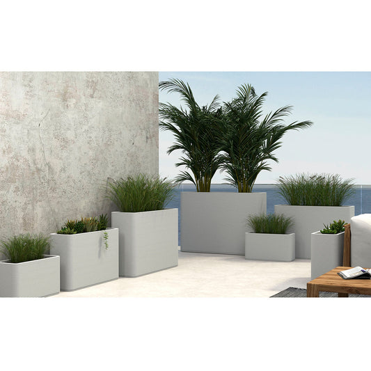 A group of Avila Rectangular Planters in Glacial Mist 3D-printed concrete with ribbed texture, modern lightweight GFRC design for indoor or outdoor use