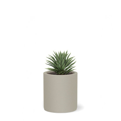 Solana Small Round Planter in Limestone Veil 3D-printed concrete with ribbed texture, modern cylindrical design for indoor or outdoor use