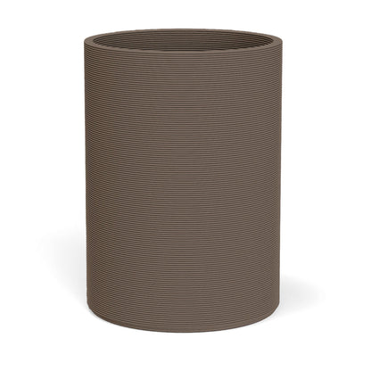 Solana XL Round Planter in Riverbed Earth, featuring a sleek vertical ribbed texture and cylindrical silhouette made from 3D-printed GFRC concrete.